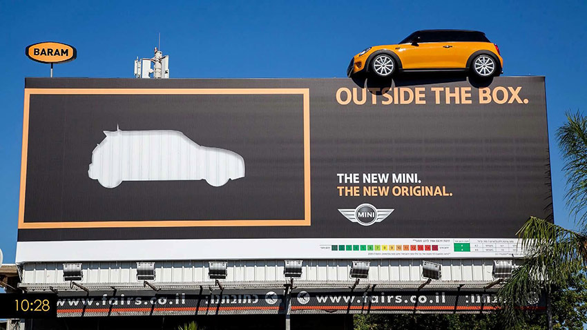 Mini surprised once more by putting a car on top of a billboard "Outside The Box" LG Hom-Bot Vacuum Cleaner Campaigns of the World®