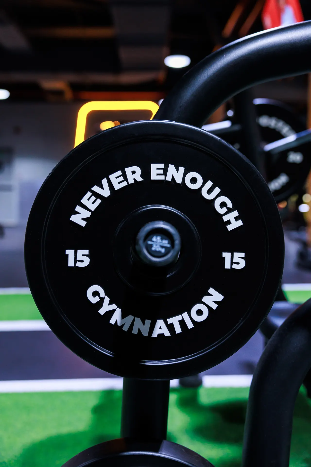 GymNation Worry Bench featuring weight plates inscribed with everyday worries such as The Future, Imposter Syndrome and Doom Scrolling