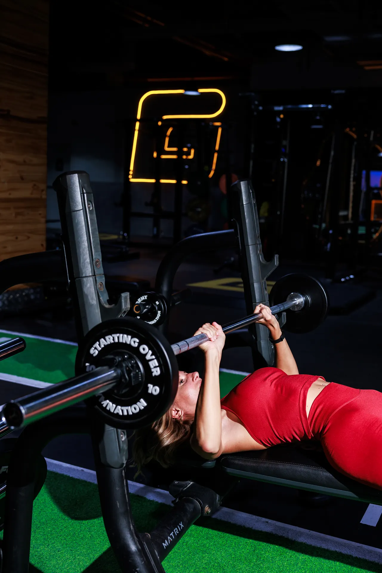 GymNation Worry Bench featuring weight plates inscribed with everyday worries such as The Future, Imposter Syndrome and Doom Scrolling